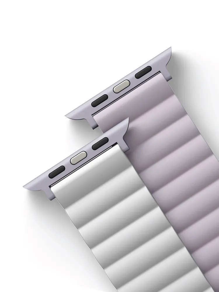 На фото изображено Ремешок силиконовый двусторонний Uniq для Apple Watch (40,41,42 мм), лавандовый-белый