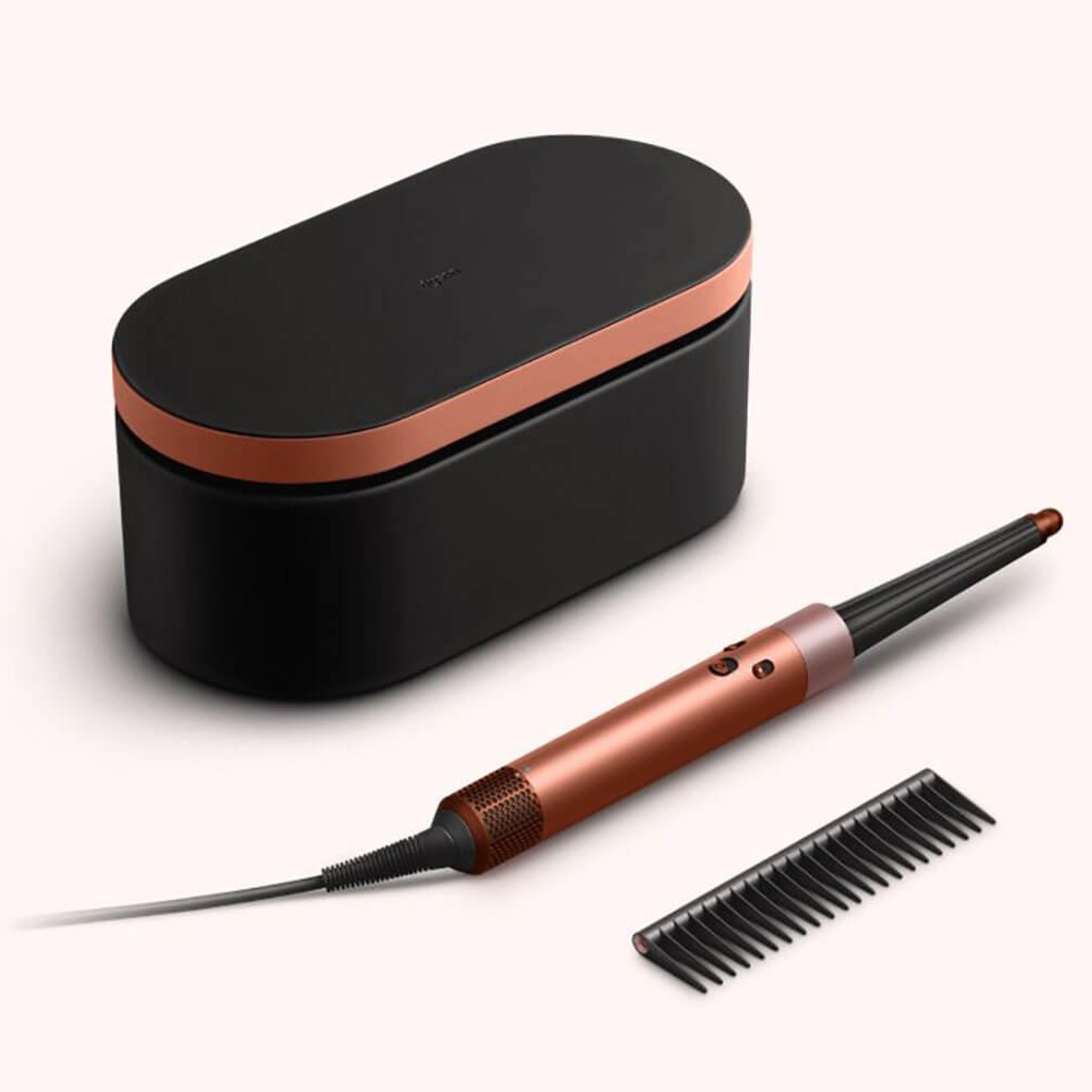 На фото изображено Стайлер Dyson Airwrap ID HS08 Complete Long, Amber Silk